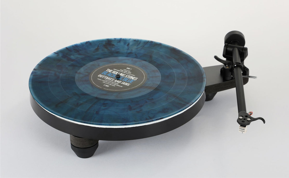 Rega Replay turntable with a record and dustcover removed