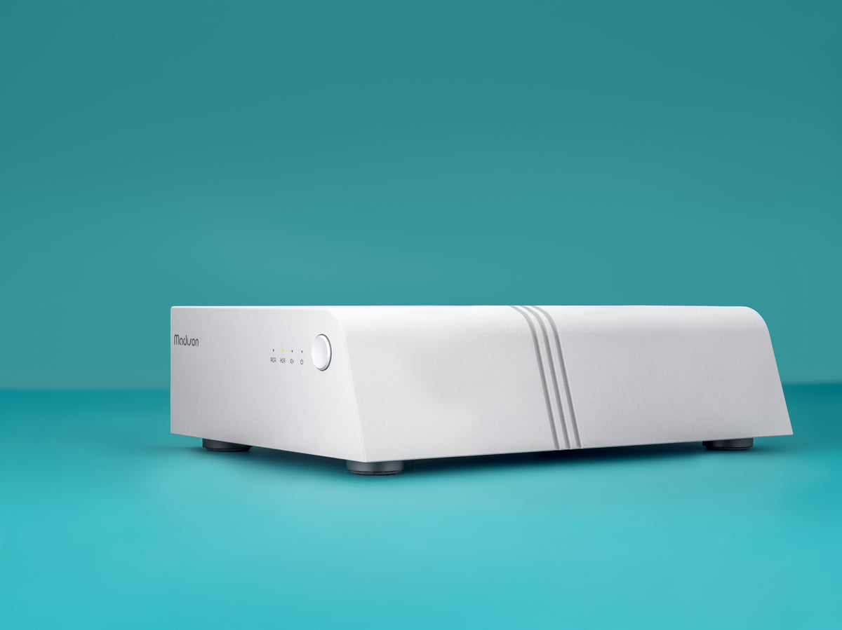 Wattson Audio Madison Amplifier in light grey, low front three-quarter view